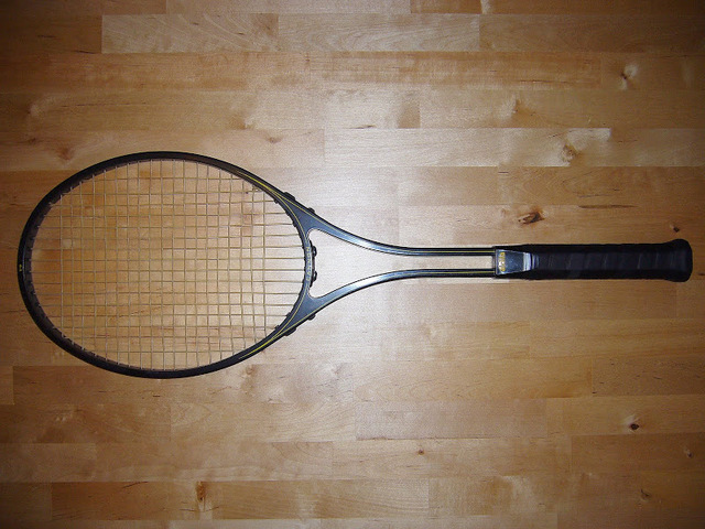 First graphite and fiberglass racquet