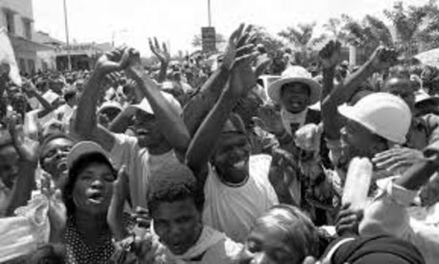Police open fire on an unarmed crowd at a PAC demonstration
