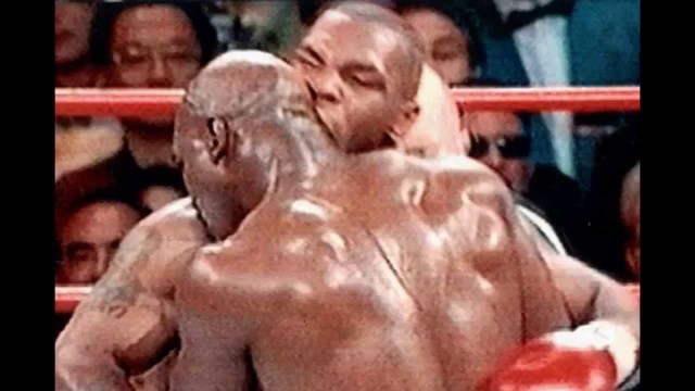 Tyson bites Holyfield