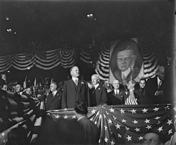 Hoover postpones war debt payments.