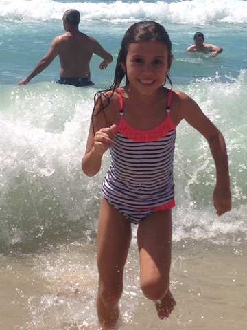 Running out of the wave in Bondi Beach