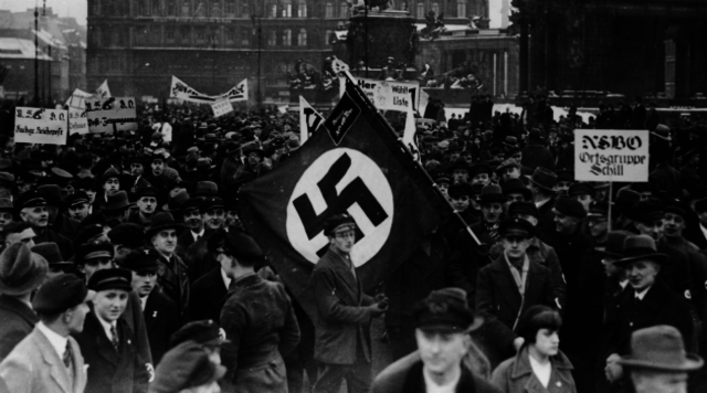 Hitler defies the Treaty of Versailles