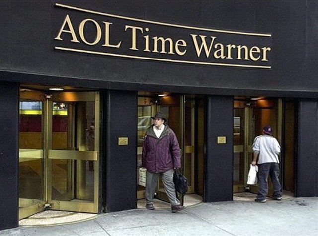 America Online buys Time Warner