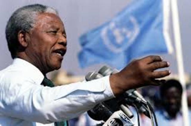 ANC wins South Africa's first democratic elections, making Mandela the country's first black president.