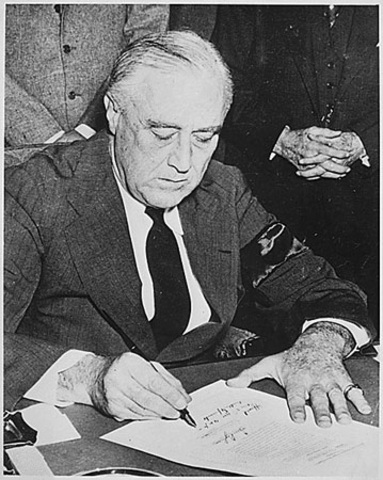 The  United States declares war on  Japan, entering World War II.