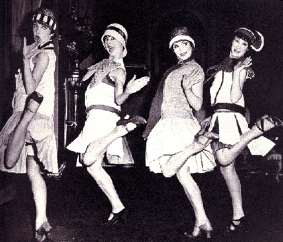 Flappers were a "new breed" of young Western women in the 1920s who wore short skirts, bobbed their hair, listened to jazz, and flaunted their disdain for what was then considered acceptable behavior.
