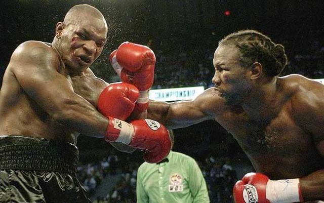 Ear biter Mike Tyson gets knocked out by Lewis