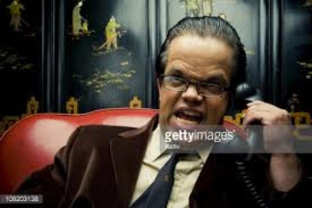 dino was picking out costumes to wear, then he picked out a  mafia boss