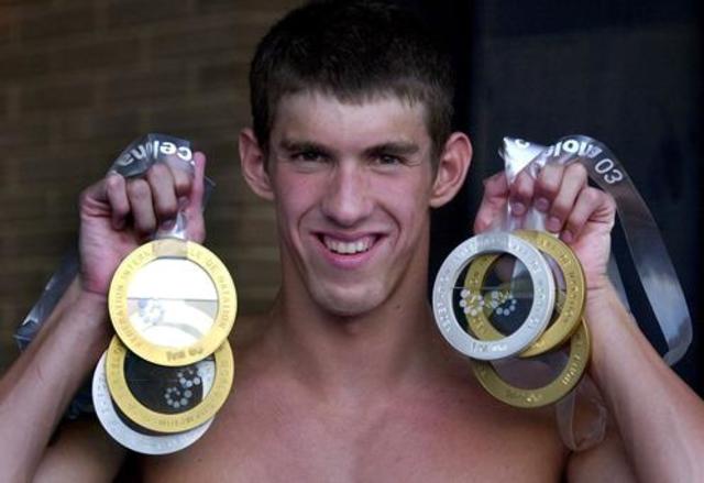 Phelps breaks world records