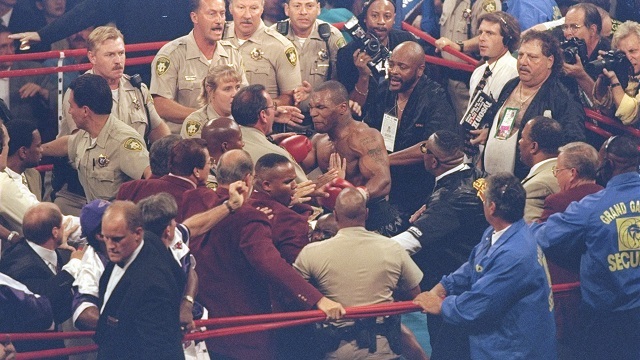 Mike Tyson Bites Evander Holyfield