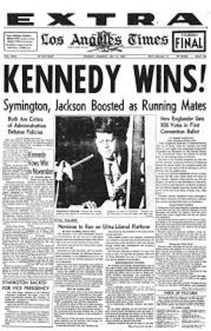 JFK wins