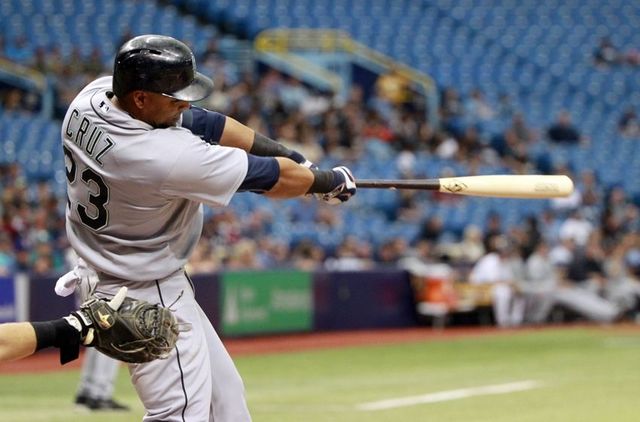 Breaks record of 60 home runs