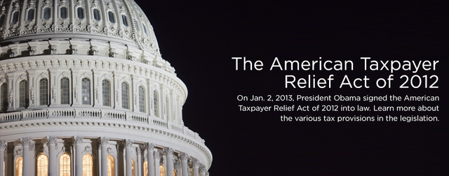 The president signs the American Taxpayer Relief Act of 2012