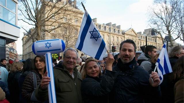 After deadly attacks, French Jews are conflicted whether to risk life in France or move to Israel.