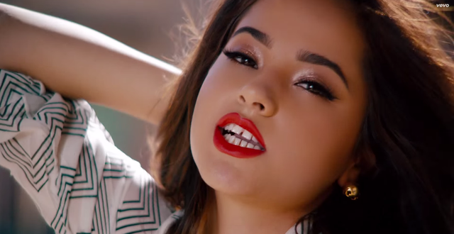 Why does Becky G have a tooth gap