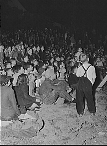 Migrant workers come to town for open air movie