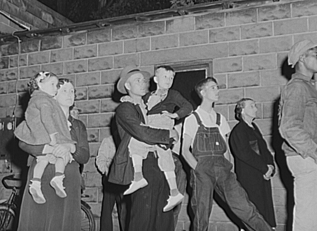 Migrant workers come to town for open air movie