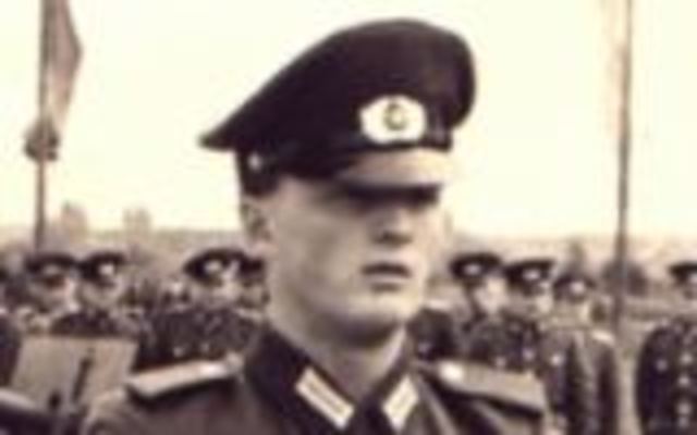 Private Hagan Koch paints a white line