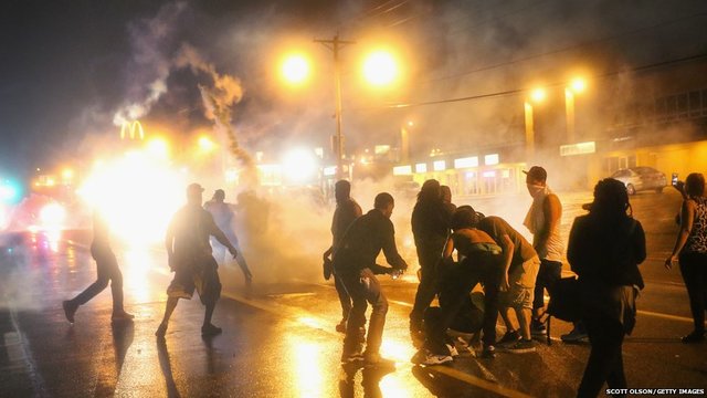 Ferguson Riots after a Mike brown “black man” was killed by a police officer while he was unarmed looting starting fire and riot in the street started.