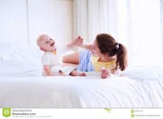 Paula cries and her mother conforts her.