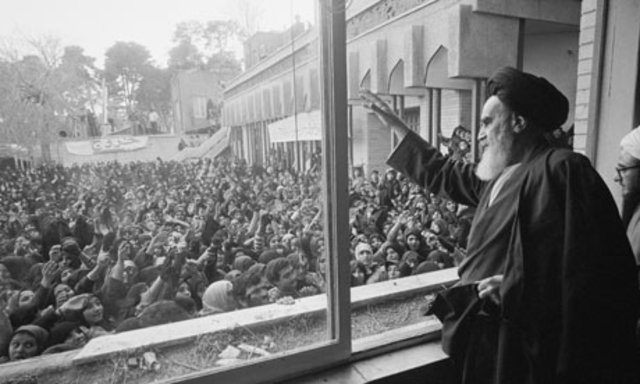 Ayatollah Ruhollah Khomeini returns to Iran after 14 years in exile, to lead the country