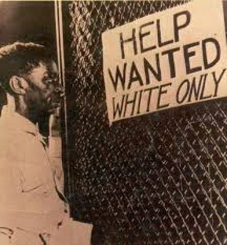 Help wanted whites only sign.