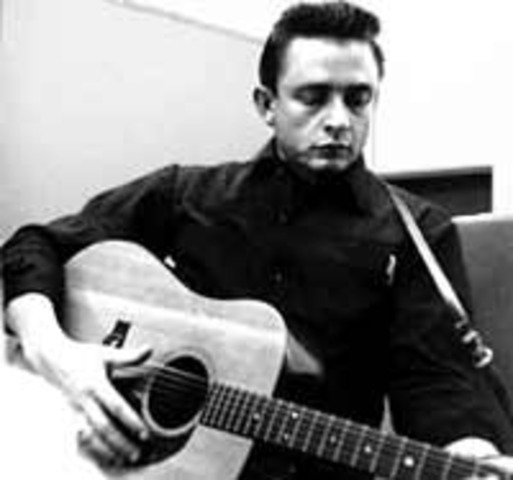 Johnny Cash releases  "I Walk the Line"