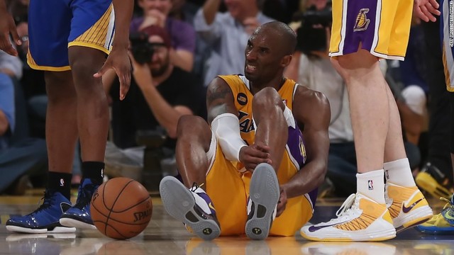 Kobe tears his Achilles tendon in a game against the Golden State Warriors.