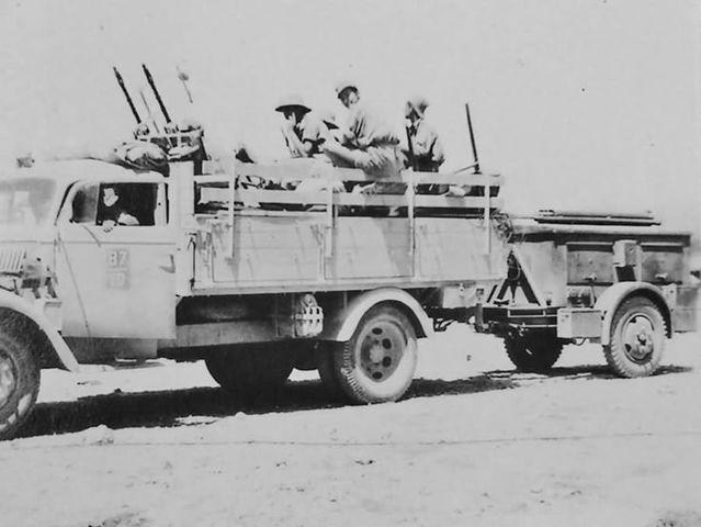 Italian resistance fighters ambush German trucks near the northern Italian city of Milan