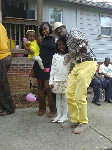 " A dad with the ladies of his life"-my daughter with her niece, bigs sister and her father.