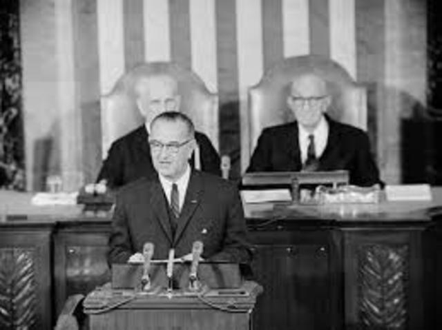 Presidential candidate Lyndon B. Johnson declares a “War on Poverty.”
