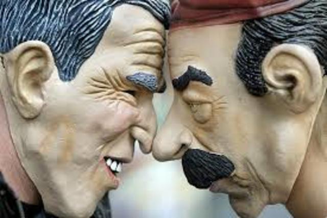 Hussein defies U.S. orders