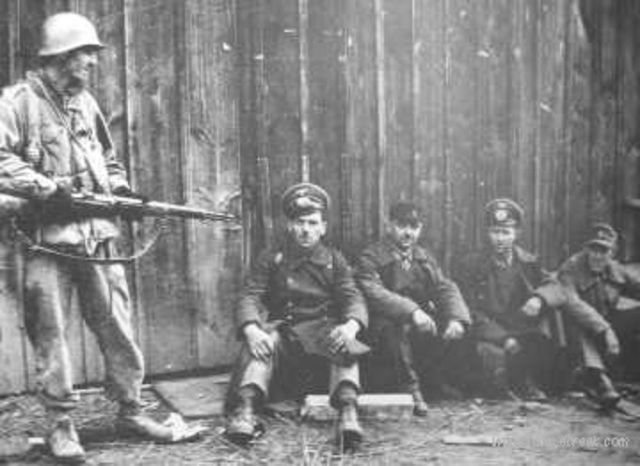 Von Braun and his team surrender to the Americans.