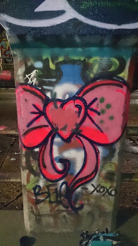 Explicit tag on heart bow-artist unknown