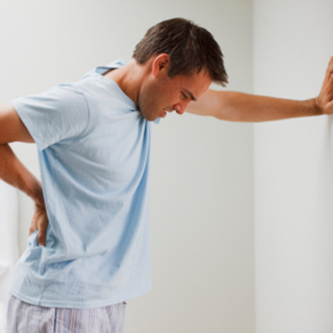 Schwerz in der Rücke