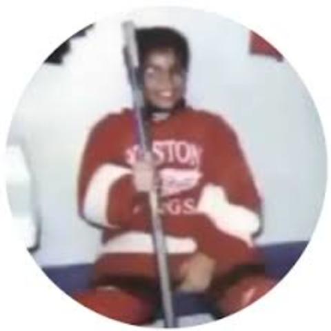 gets cross-checked in a hockey game