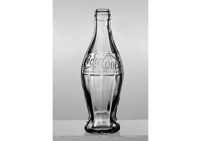Coca Cola Begins Manufacturing of Contoured Bottle