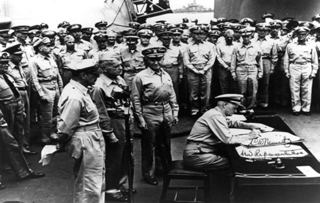 japan signs the surender agreement, ofically ending world war 2
