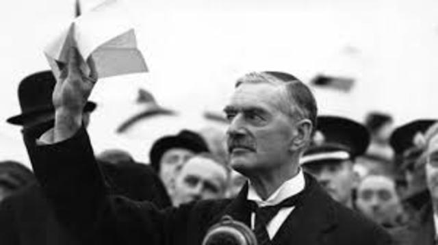 British Prime Minister Neville Chamberlain returns to London