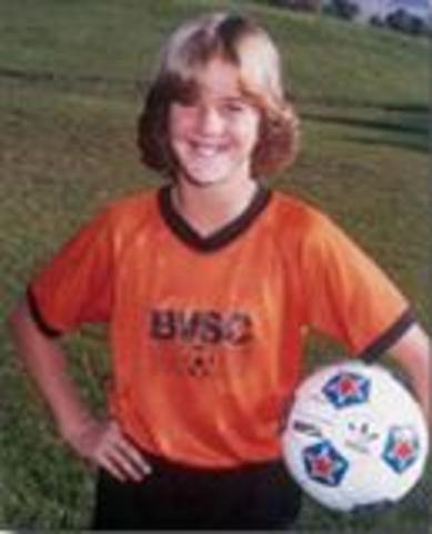 Brandi began playing soccer.