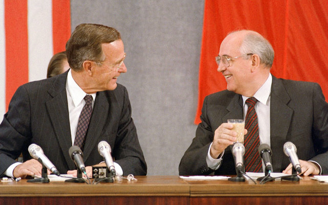 George Bush and Mikhail Gorbachev agree to the reunification of Germany