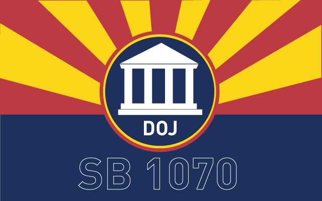 Jan Brewer signs SB1070