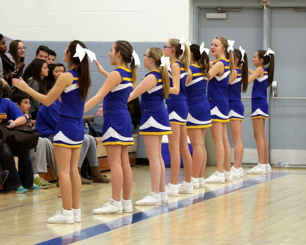 making the high school cheer team.