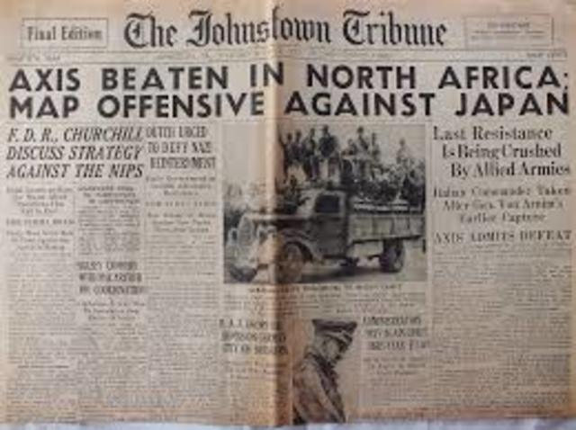 German and Italian troops surrender in North Africa.