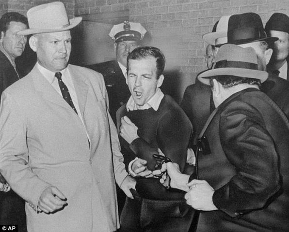 Lee Harvey Oswald, accused assassin of President Kennedy, is shot and killed by Jack Ruby, Dallas nightclub owner