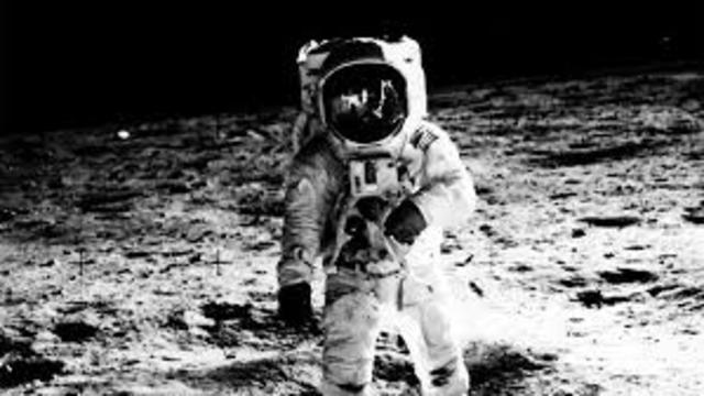 Neil Armstrong walks on the moon.