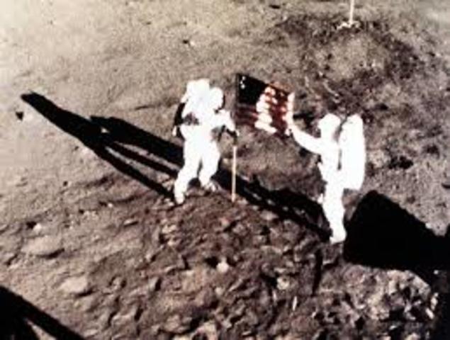 Neil Armstrong walks on the moon