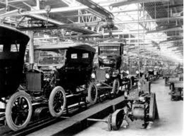 Henry Ford Installs First Moving Assembly Line
