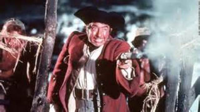 The Hispaniola arrives at Treasure Island. Long John Silver and his pirate crew revolt.