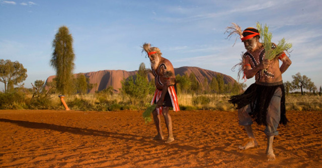 Uluru handed back to traditional owners.